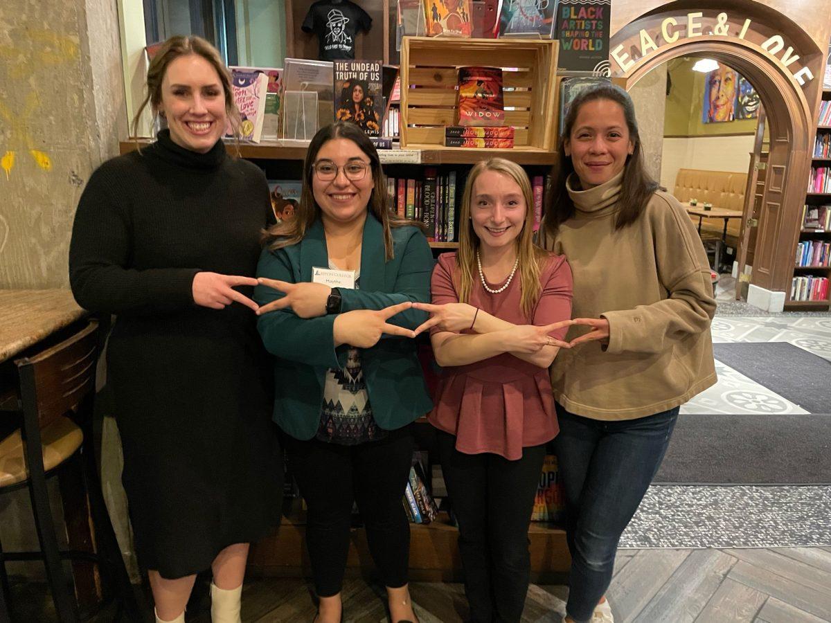 Alumni and current members of Alpha Delta Pi sorority pose. Photo courtesy of Amy Gerretsen.