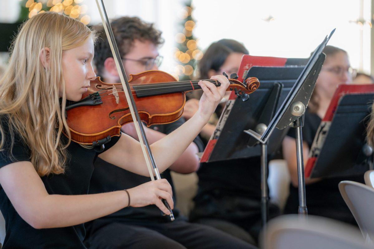 Alaina Wisteria, first-year, plays her violin in the Ripon College Holiday concert. Photo Courtesy of Ric Damm.