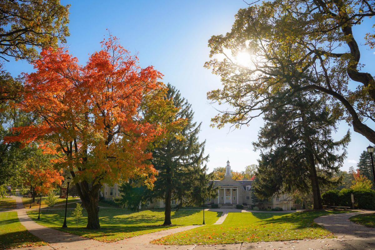 Hundreds of students fill the sidewalks outside the Great Hall at Ripon College, creating a bustling atmosphere throughout the day. Photo courtesy of Ric Damm. 
