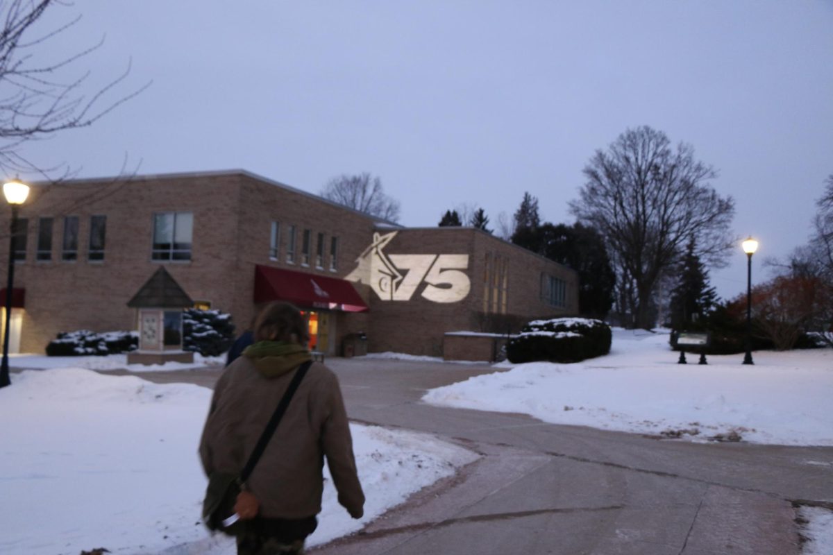 Capturing the glow of 175 years, students start to gather outside of the Commons to celebrate Ripon College's ceremonial anniversary of its founding. 